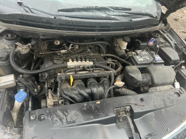 Черный Киа Рио, объемом двигателя 1.4 л и пробегом 120 тыс. км за 3000 $, фото 6 на Automoto.ua