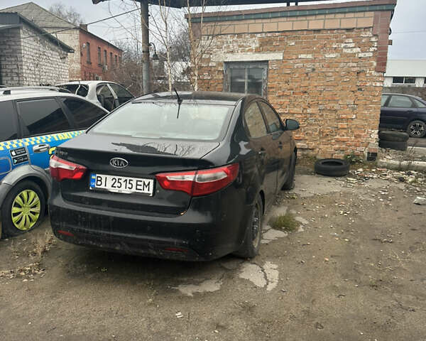 Чорний Кіа Ріо, об'ємом двигуна 1.4 л та пробігом 100 тис. км за 3500 $, фото 1 на Automoto.ua