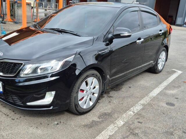 Чорний Кіа Ріо, об'ємом двигуна 1.59 л та пробігом 127 тис. км за 8800 $, фото 2 на Automoto.ua