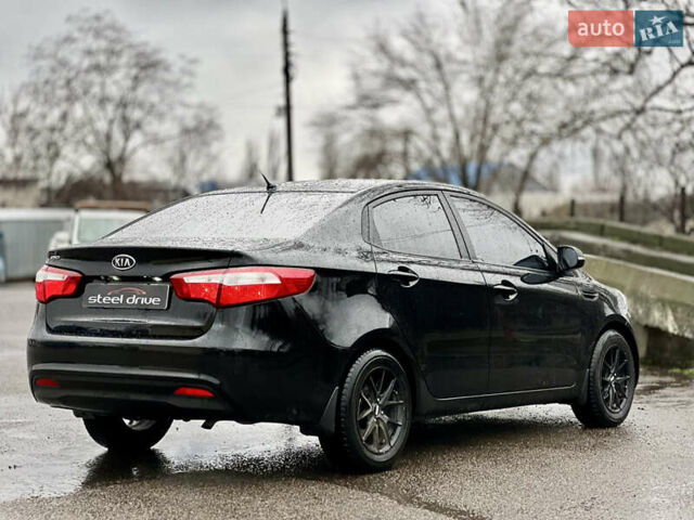Черный Киа Рио, объемом двигателя 1.6 л и пробегом 231 тыс. км за 7999 $, фото 5 на Automoto.ua