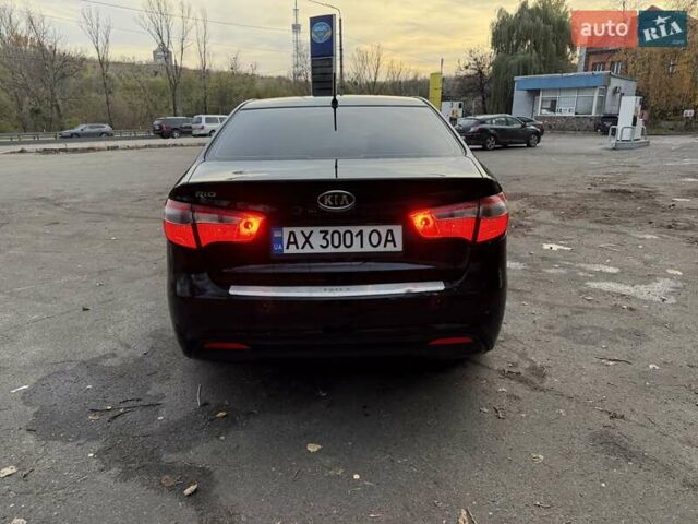 Чорний Кіа Ріо, об'ємом двигуна 1.59 л та пробігом 154 тис. км за 7600 $, фото 3 на Automoto.ua
