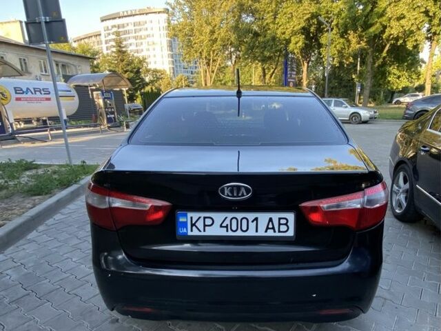 Черный Киа Рио, объемом двигателя 1.6 л и пробегом 330 тыс. км за 6300 $, фото 1 на Automoto.ua