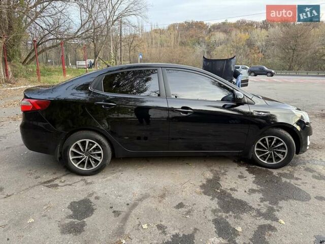 Чорний Кіа Ріо, об'ємом двигуна 1.59 л та пробігом 154 тис. км за 7600 $, фото 5 на Automoto.ua