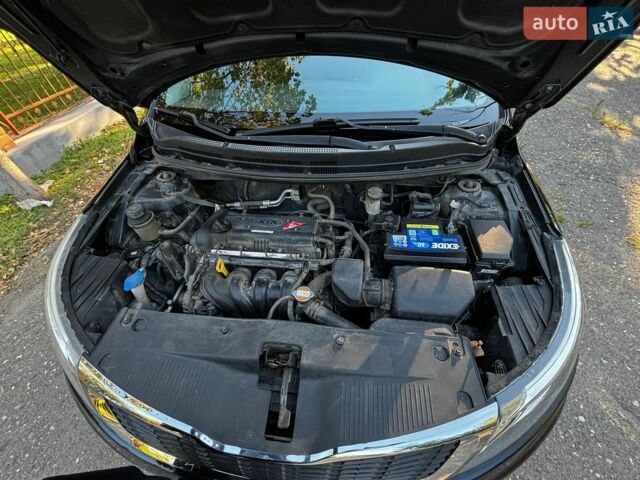 Чорний Кіа Ріо, об'ємом двигуна 1.4 л та пробігом 165 тис. км за 7900 $, фото 36 на Automoto.ua