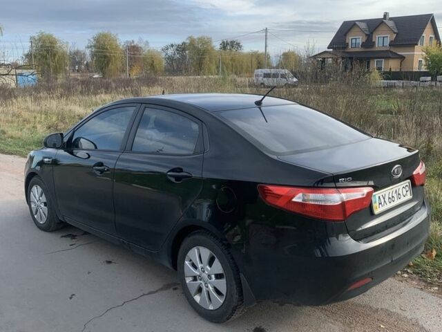 Чорний Кіа Ріо, об'ємом двигуна 1.4 л та пробігом 190 тис. км за 5500 $, фото 4 на Automoto.ua