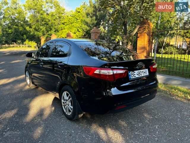 Чорний Кіа Ріо, об'ємом двигуна 1.4 л та пробігом 165 тис. км за 7900 $, фото 9 на Automoto.ua