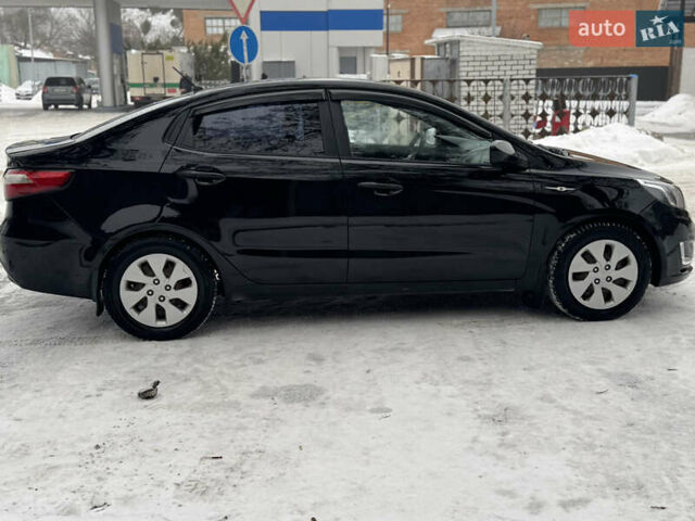Черный Киа Рио, объемом двигателя 1.4 л и пробегом 155 тыс. км за 7500 $, фото 7 на Automoto.ua