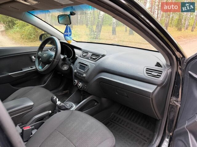 Чорний Кіа Ріо, об'ємом двигуна 1.4 л та пробігом 193 тис. км за 6300 $, фото 20 на Automoto.ua