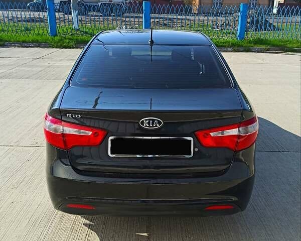 Черный Киа Рио, объемом двигателя 1.4 л и пробегом 125 тыс. км за 6700 $, фото 4 на Automoto.ua