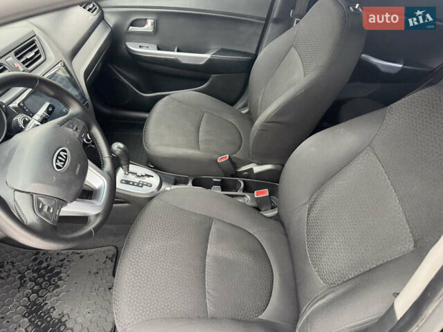 Черный Киа Рио, объемом двигателя 1.4 л и пробегом 155 тыс. км за 7500 $, фото 24 на Automoto.ua