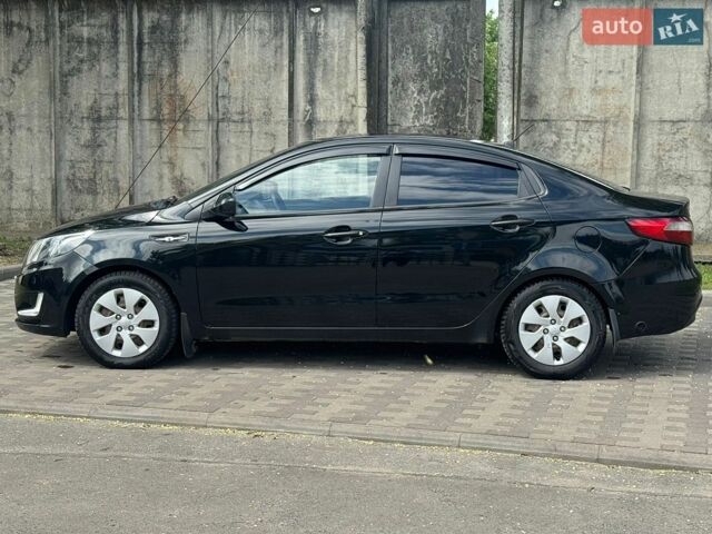 Черный Киа Рио, объемом двигателя 1.4 л и пробегом 155 тыс. км за 7500 $, фото 6 на Automoto.ua