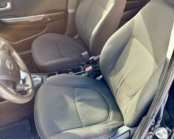 Черный Киа Рио, объемом двигателя 1.6 л и пробегом 270 тыс. км за 6650 $, фото 11 на Automoto.ua