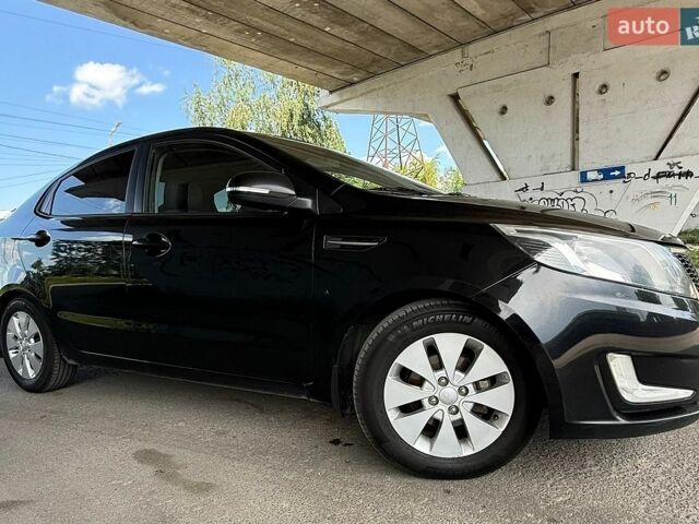 Черный Киа Рио, объемом двигателя 1.59 л и пробегом 204 тыс. км за 7000 $, фото 7 на Automoto.ua