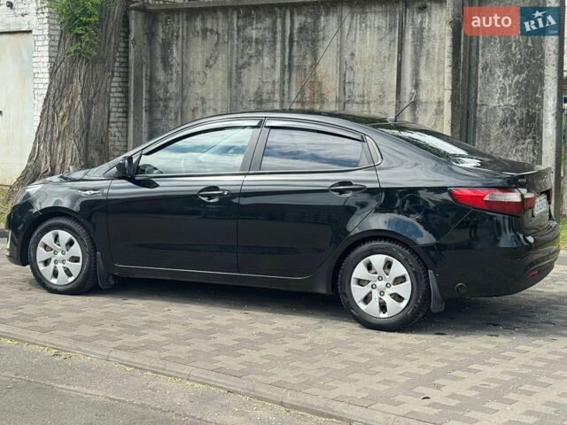 Черный Киа Рио, объемом двигателя 1.4 л и пробегом 155 тыс. км за 7500 $, фото 8 на Automoto.ua