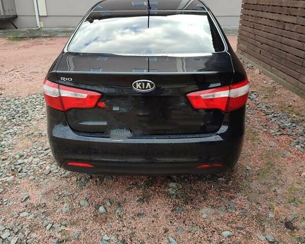 Черный Киа Рио, объемом двигателя 1.4 л и пробегом 170 тыс. км за 8500 $, фото 1 на Automoto.ua