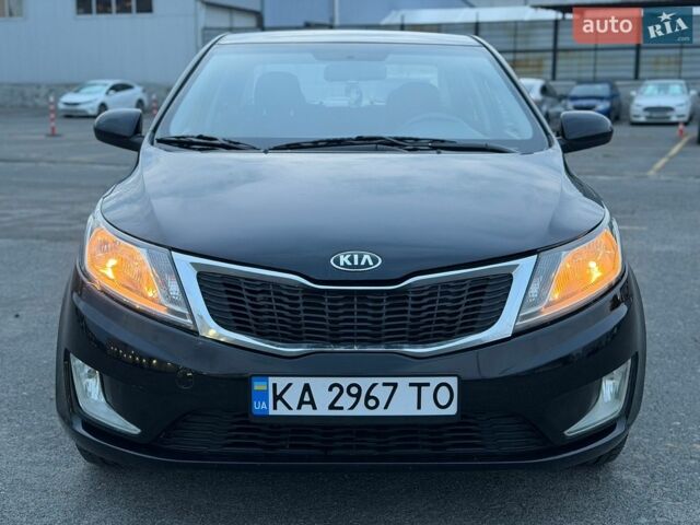 Чорний Кіа Ріо, об'ємом двигуна 1.4 л та пробігом 201 тис. км за 6950 $, фото 7 на Automoto.ua