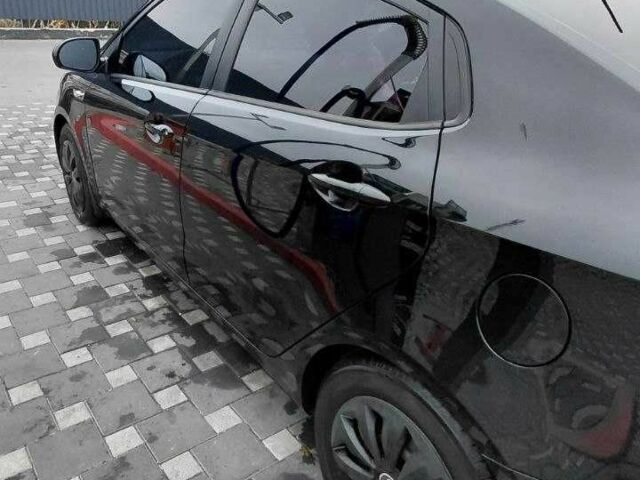 Чорний Кіа Ріо, об'ємом двигуна 1.4 л та пробігом 102 тис. км за 7394 $, фото 6 на Automoto.ua