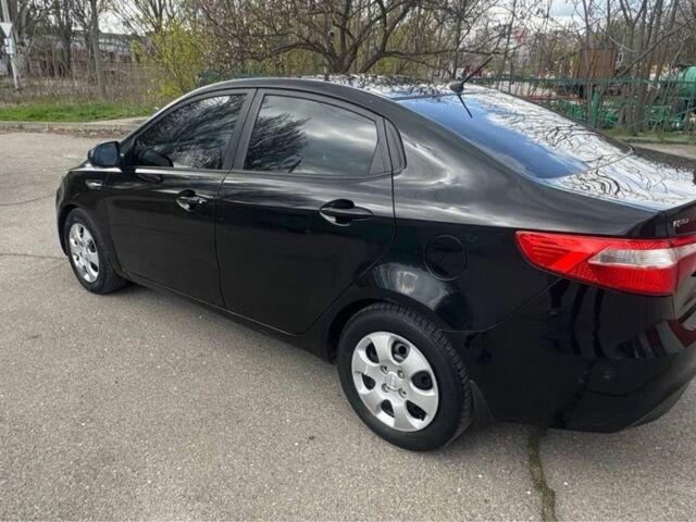 Чорний Кіа Ріо, об'ємом двигуна 1.6 л та пробігом 273 тис. км за 6200 $, фото 1 на Automoto.ua