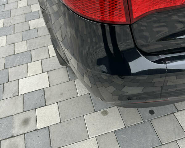 Черный Киа Рио, объемом двигателя 1.4 л и пробегом 111 тыс. км за 7500 $, фото 8 на Automoto.ua