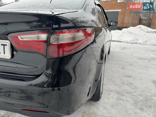 Черный Киа Рио, объемом двигателя 1.4 л и пробегом 155 тыс. км за 7500 $, фото 16 на Automoto.ua