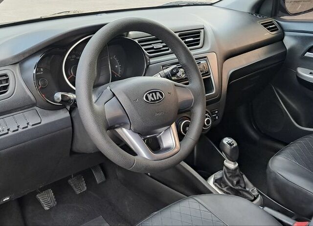 Чорний Кіа Ріо, об'ємом двигуна 1.4 л та пробігом 89 тис. км за 6800 $, фото 4 на Automoto.ua