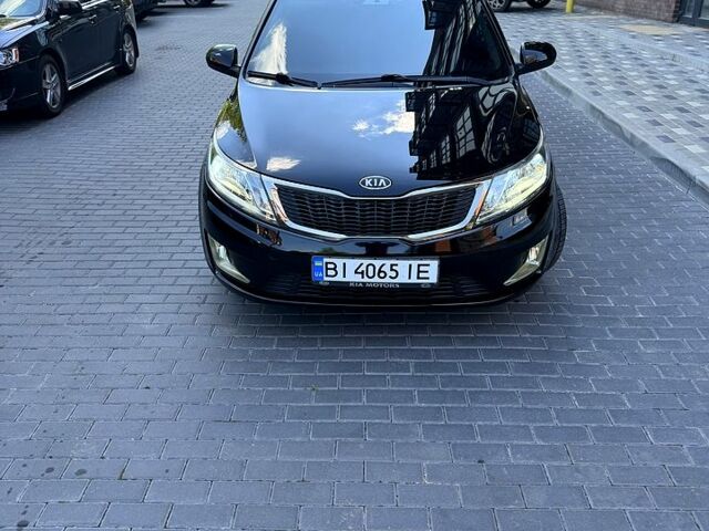 Чорний Кіа Ріо, об'ємом двигуна 1.4 л та пробігом 103 тис. км за 7800 $, фото 1 на Automoto.ua