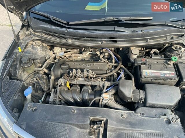 Чорний Кіа Ріо, об'ємом двигуна 1.4 л та пробігом 178 тис. км за 7800 $, фото 11 на Automoto.ua