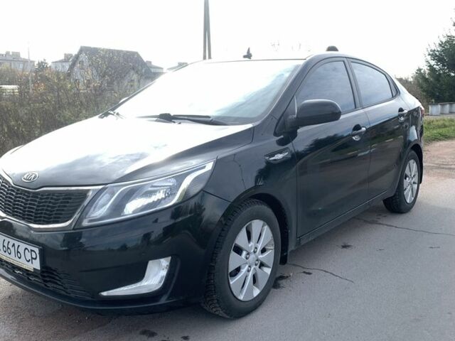 Чорний Кіа Ріо, об'ємом двигуна 1.4 л та пробігом 190 тис. км за 5500 $, фото 1 на Automoto.ua
