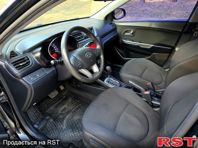 Черный Киа Рио, объемом двигателя 1.6 л и пробегом 103 тыс. км за 6800 $, фото 6 на Automoto.ua