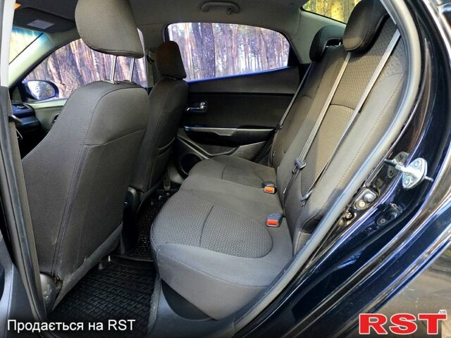 Черный Киа Рио, объемом двигателя 1.6 л и пробегом 103 тыс. км за 6800 $, фото 7 на Automoto.ua