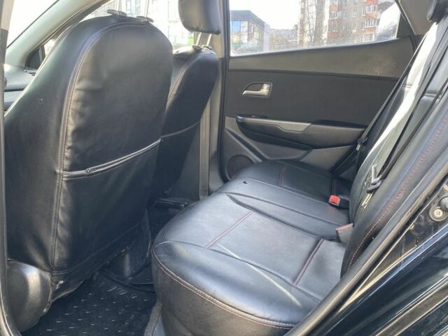 Чорний Кіа Ріо, об'ємом двигуна 1.6 л та пробігом 252 тис. км за 3650 $, фото 6 на Automoto.ua