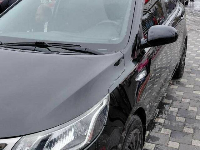 Чорний Кіа Ріо, об'ємом двигуна 1.4 л та пробігом 102 тис. км за 7394 $, фото 9 на Automoto.ua