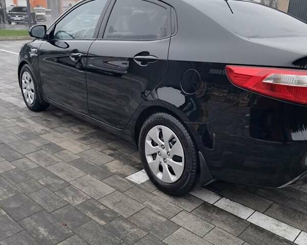 Черный Киа Рио, объемом двигателя 1.4 л и пробегом 244 тыс. км за 6900 $, фото 11 на Automoto.ua