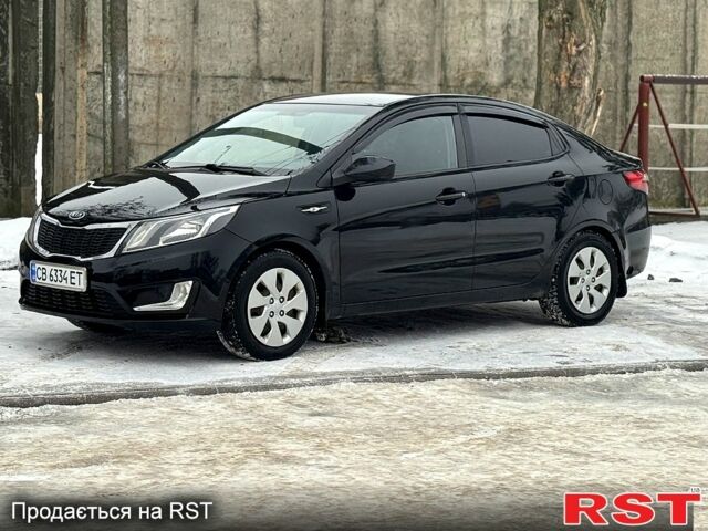 Черный Киа Рио, объемом двигателя 1.4 л и пробегом 155 тыс. км за 7500 $, фото 2 на Automoto.ua