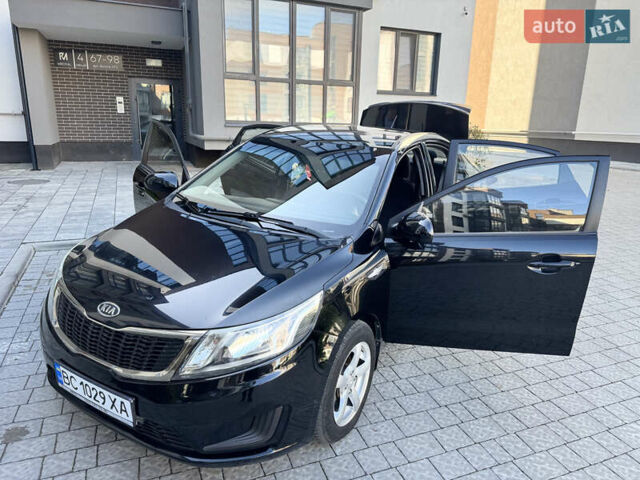 Чорний Кіа Ріо, об'ємом двигуна 1.4 л та пробігом 199 тис. км за 5950 $, фото 18 на Automoto.ua