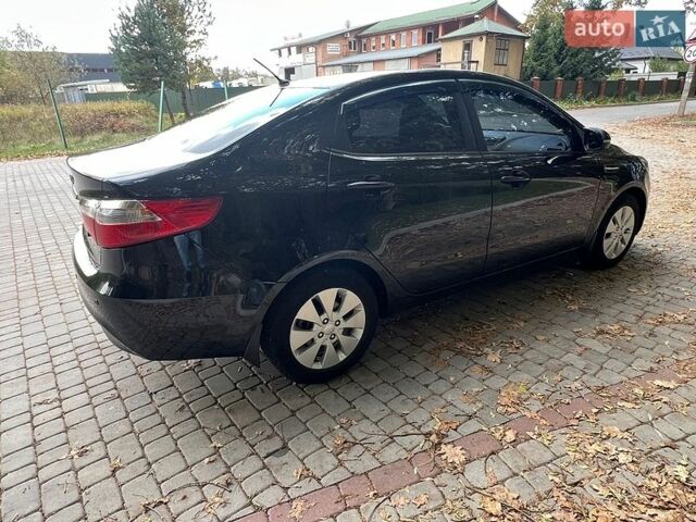 Черный Киа Рио, объемом двигателя 1.59 л и пробегом 160 тыс. км за 8200 $, фото 3 на Automoto.ua