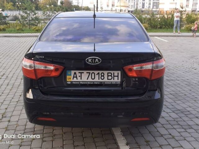 Чорний Кіа Ріо, об'ємом двигуна 1.4 л та пробігом 80 тис. км за 8700 $, фото 3 на Automoto.ua