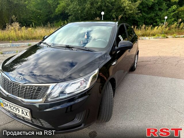 Черный Киа Рио, объемом двигателя 1.4 л и пробегом 74 тыс. км за 9100 $, фото 2 на Automoto.ua