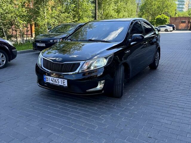 Чорний Кіа Ріо, об'ємом двигуна 1.4 л та пробігом 103 тис. км за 7800 $, фото 2 на Automoto.ua