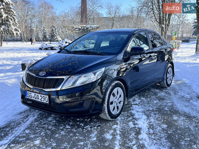 Чорний Кіа Ріо, об'ємом двигуна 1.4 л та пробігом 245 тис. км за 7600 $, фото 4 на Automoto.ua