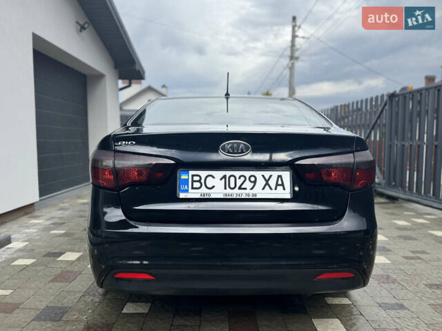 Чорний Кіа Ріо, об'ємом двигуна 1.4 л та пробігом 199 тис. км за 5999 $, фото 5 на Automoto.ua