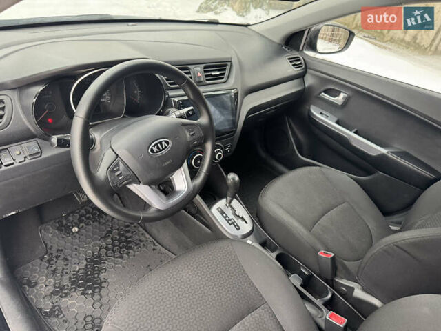 Черный Киа Рио, объемом двигателя 1.4 л и пробегом 155 тыс. км за 7500 $, фото 23 на Automoto.ua