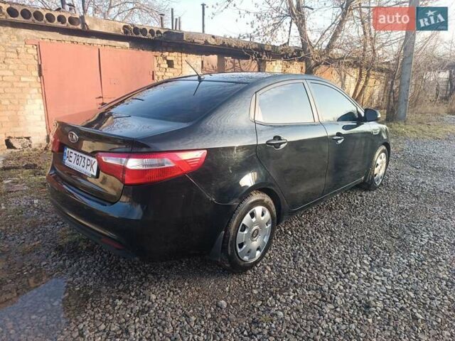 Черный Киа Рио, объемом двигателя 1.59 л и пробегом 178 тыс. км за 8400 $, фото 2 на Automoto.ua