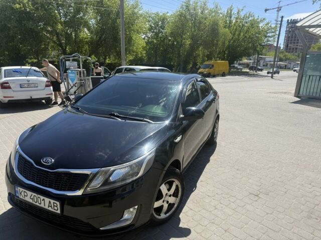 Черный Киа Рио, объемом двигателя 1.6 л и пробегом 330 тыс. км за 5500 $, фото 4 на Automoto.ua