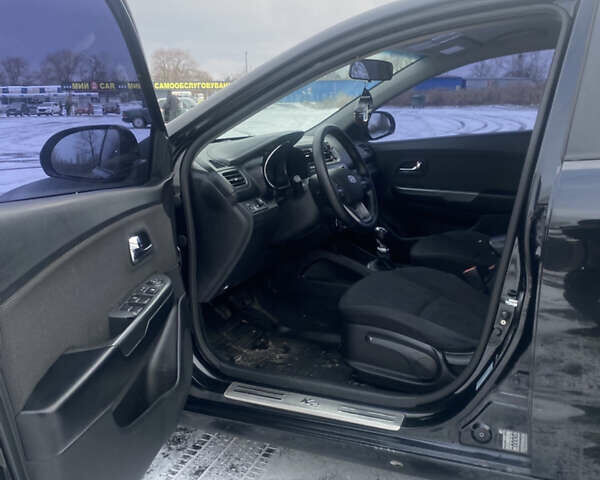 Черный Киа Рио, объемом двигателя 1.59 л и пробегом 250 тыс. км за 6900 $, фото 8 на Automoto.ua