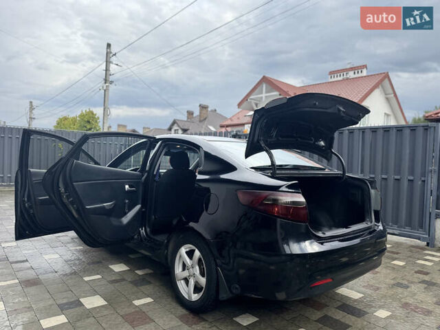 Чорний Кіа Ріо, об'ємом двигуна 1.4 л та пробігом 199 тис. км за 5999 $, фото 26 на Automoto.ua