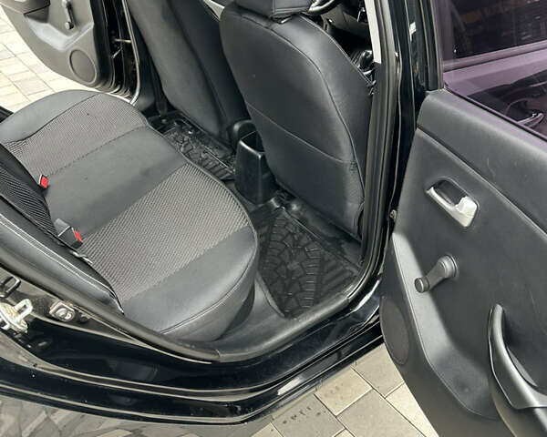 Черный Киа Рио, объемом двигателя 1.4 л и пробегом 111 тыс. км за 7500 $, фото 12 на Automoto.ua