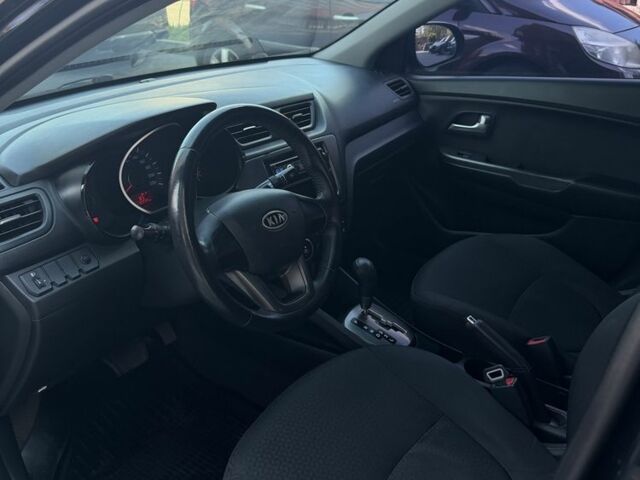 Чорний Кіа Ріо, об'ємом двигуна 1.4 л та пробігом 103 тис. км за 7999 $, фото 6 на Automoto.ua