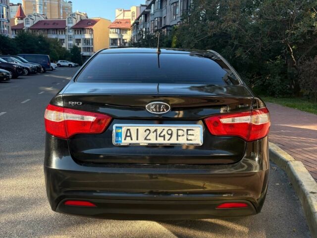 Черный Киа Рио, объемом двигателя 1.6 л и пробегом 292 тыс. км за 7020 $, фото 3 на Automoto.ua