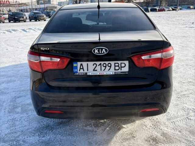 Чорний Кіа Ріо, об'ємом двигуна 1.6 л та пробігом 270 тис. км за 6499 $, фото 8 на Automoto.ua